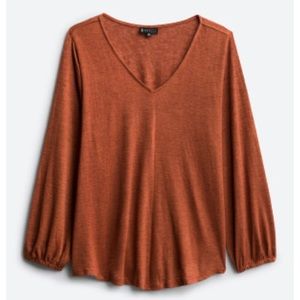 Burnt orange knit blouse